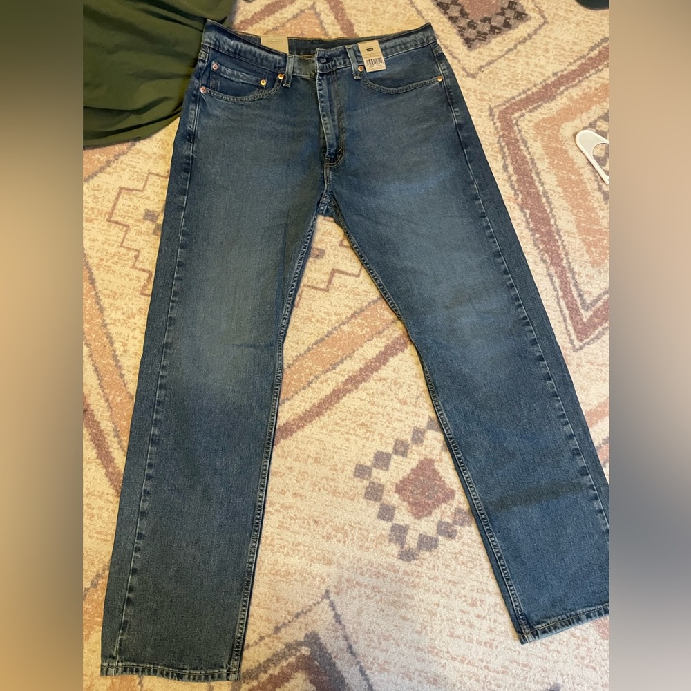 Levis, new with tags, never warn, blue jeans